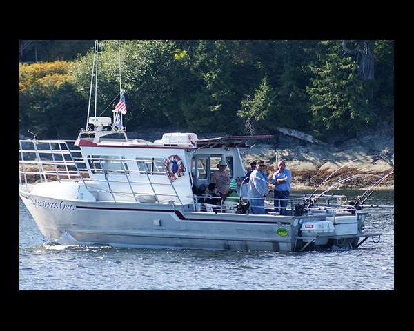 Experience One Charters people on a boat