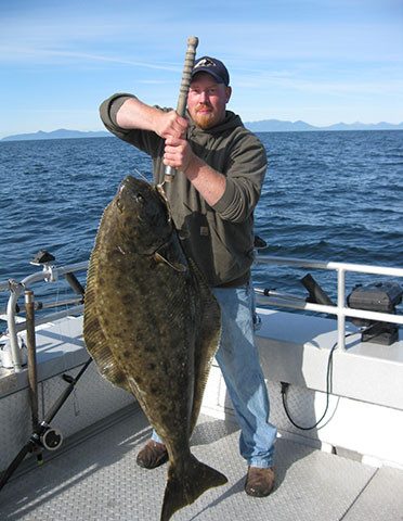 Catch of the Day! man holding fish
