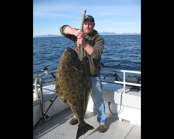 Catch of the Day! man holding fish